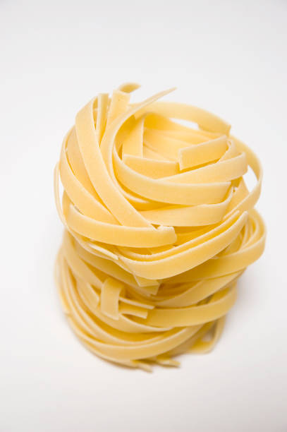 Tagliatelle, dried pasta stock photo