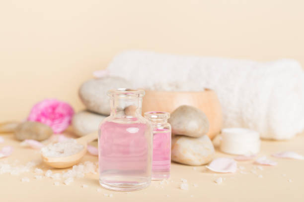 istock Spa composition with pink roses on wooden table 1737551428