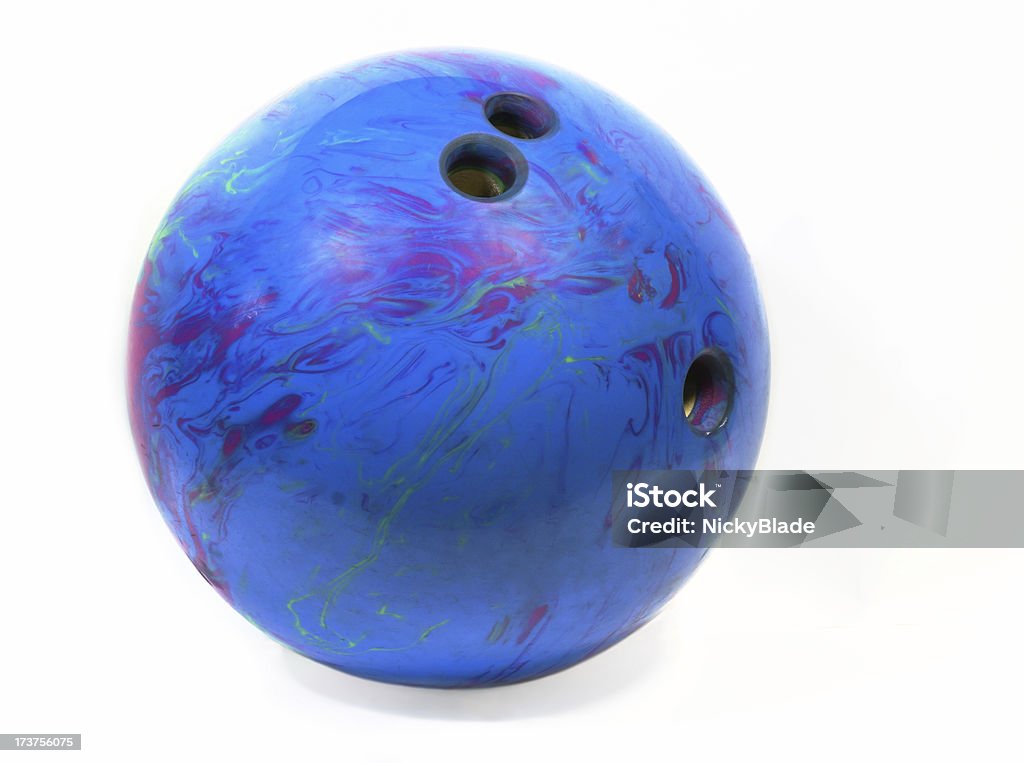Purple and blue bowling ball with three drilled holes An old blue bowling ball. Bowling Ball Stock Photo