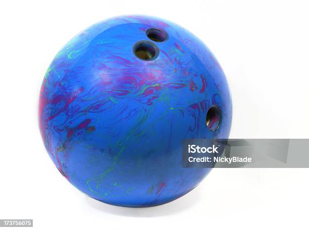 Purple And Blue Bowling Ball With Three Drilled Holes Stock Photo - Download Image Now
