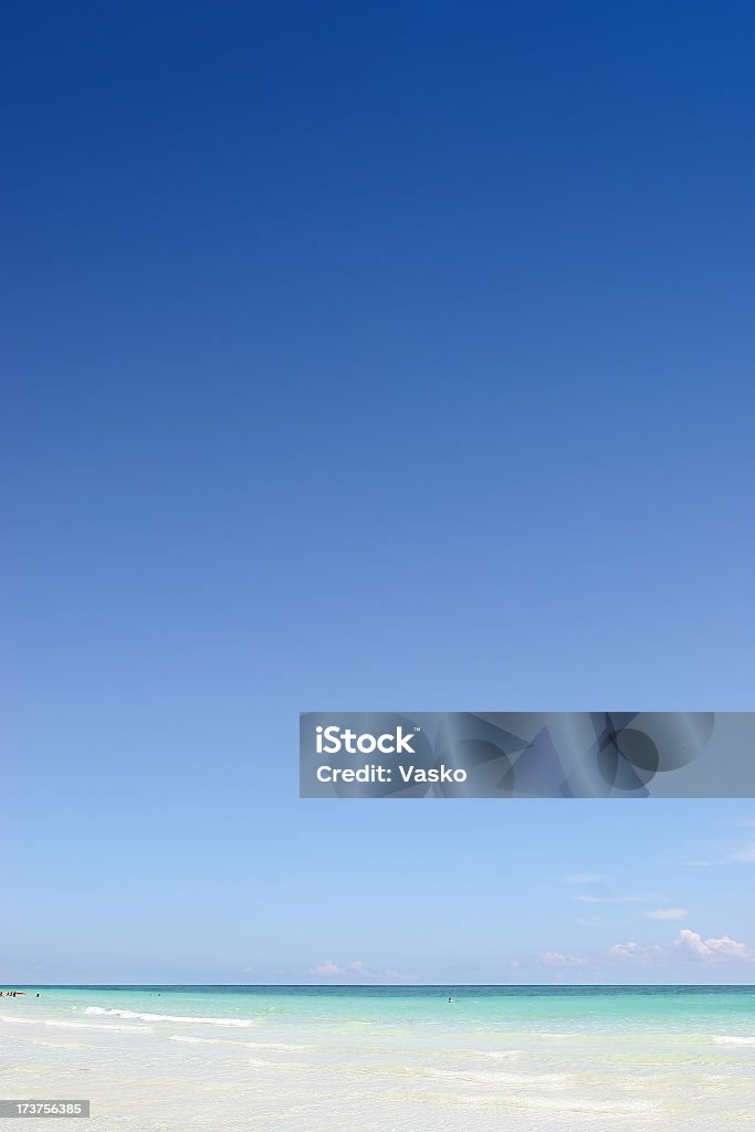 An ocean view horizon with blue sky This is a picture of the big blue sky over a white sand beach. Alternative Therapy Stock Photo