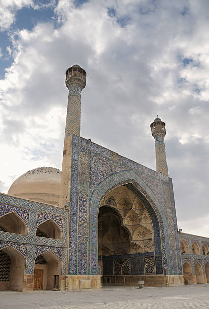 Ceiling and wall tilework at the Shah Mosque on Imam Square, Isfahan, Iran. The mosque is also known as Imam Mosque and Jaame' Abbasi Mosque. It is one of the masterpieces of Iranian/Persian Architecture and an excellent example of Islamic era architecture of Iran and also one of the top sights of the contry.