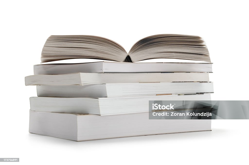 Pile de livres isolé sur blanc - Photo de Empilé libre de droits