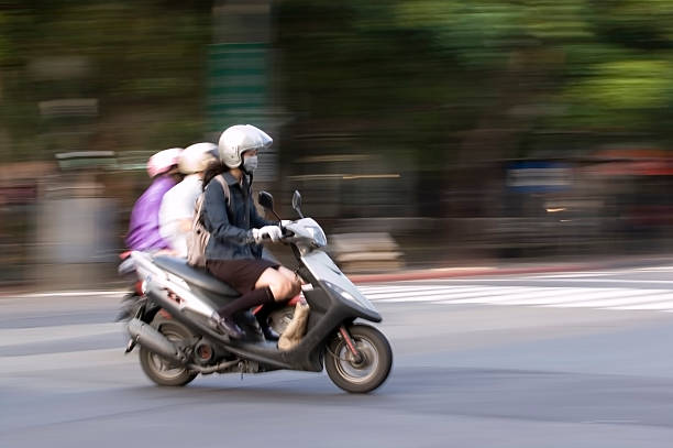 istock Motor scooter in motion 173757214