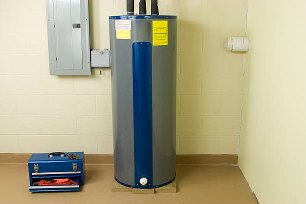 residential warmwasserbereiter - water heater boiler water pipe basement stock-fotos und bilder