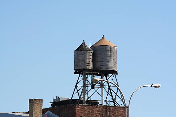 istock Couple of Rooftop Water Tanks 173757739