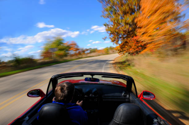 istock Convertible driving in the Fall. 173757856
