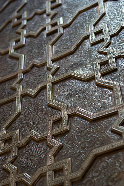istock Islamic Pattern Door Dark Wood Moroccan Mosque in Fez 173758238