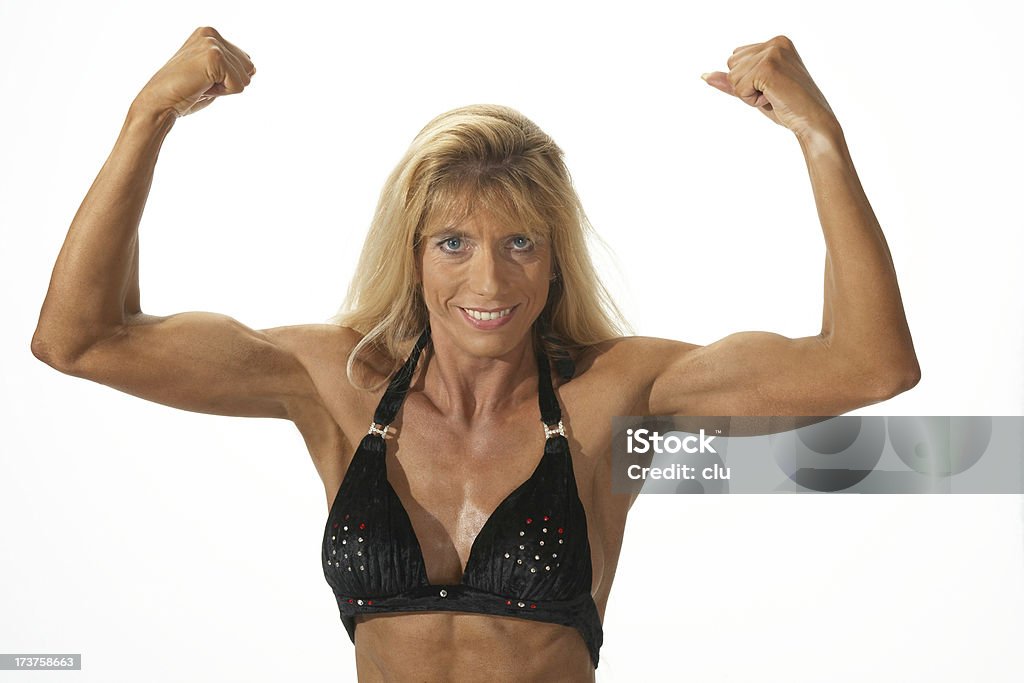 Poder feminino: bodybuilder posando - Foto de stock de Academia de ginástica royalty-free