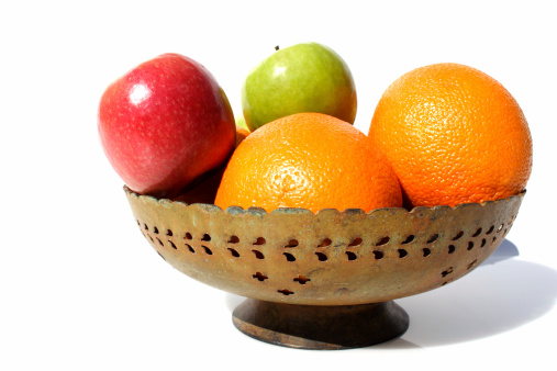 brass bowl of indian design with fresh fruit