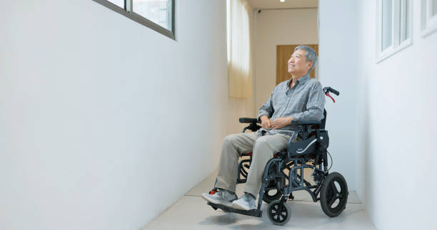 istock senior man sit in wheelchair 1737587328