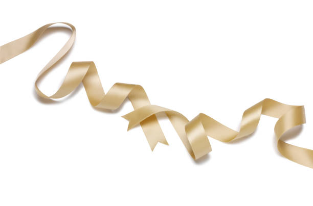 Twists of gold ribbon on a white background.