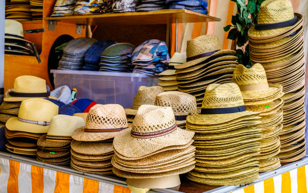 istock straw hats at a market 1737590541
