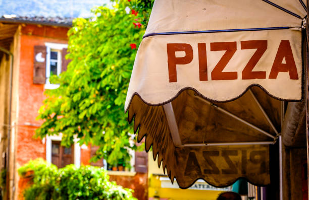 istock typical old Pizzeria sign in italy 1737594513