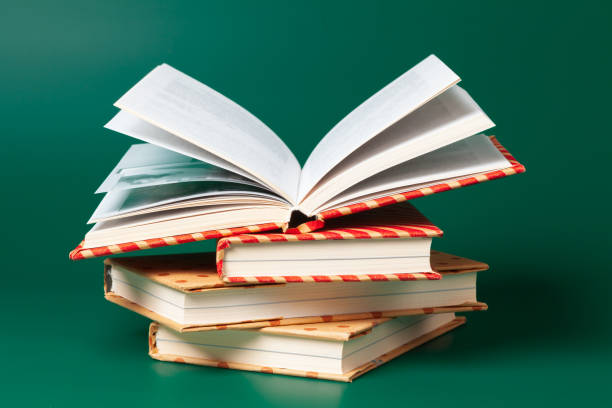 istock books isolated on green background 1737596636