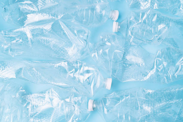 istock Plastic empty bottles on blue background. Copy space close up background. Recycling concept. 1737600880
