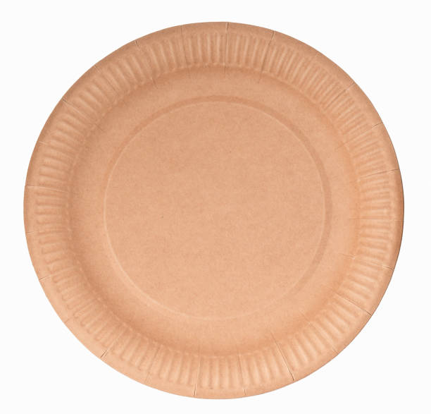 istock Kraft paper crockery: brown dishes isolated on white background. Set with disposable tableware. Recycling and zero waste concept. 1737601461