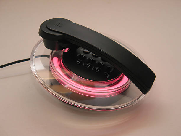 Telephone with pink neon light.