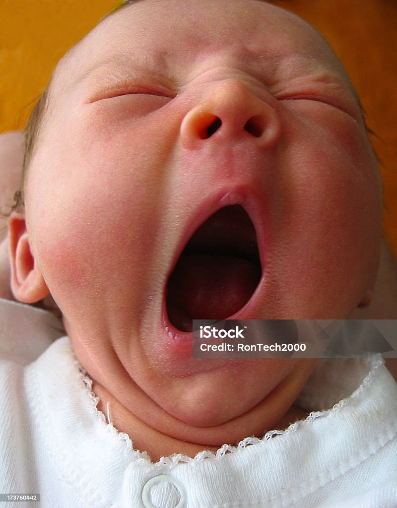 Big Yawn Newborn lets go with a big yawn. See also: Yawning Stock Photo