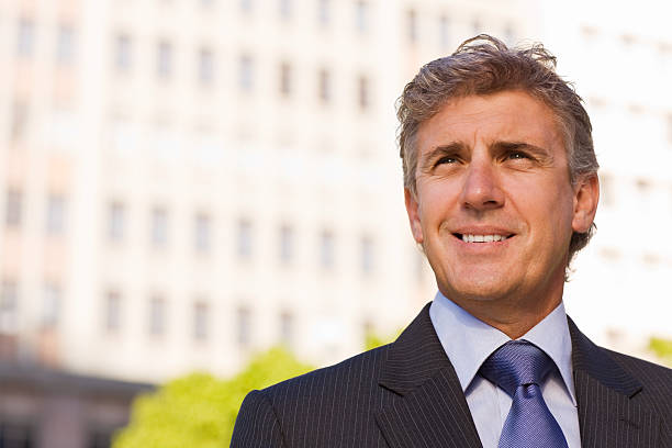 istock Happy businessman looking away 173760508