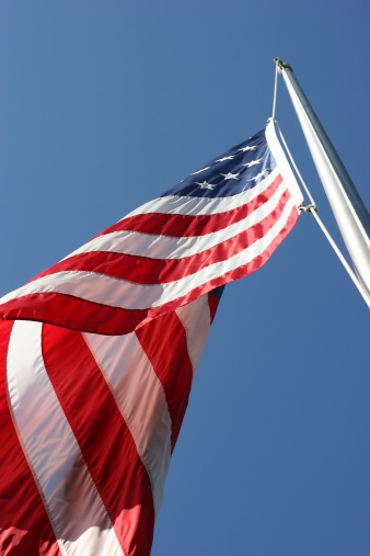 American flag against a blue sky