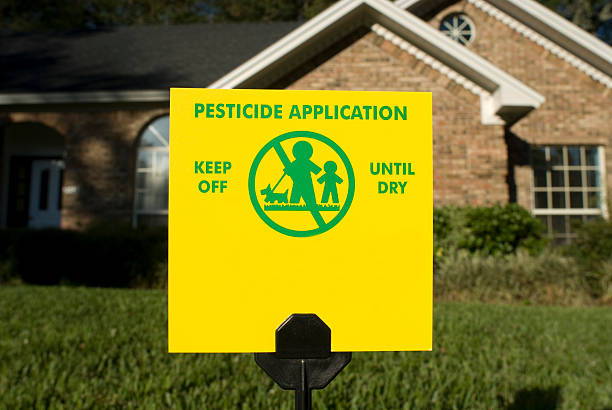 Pesticide application sign. stock photo