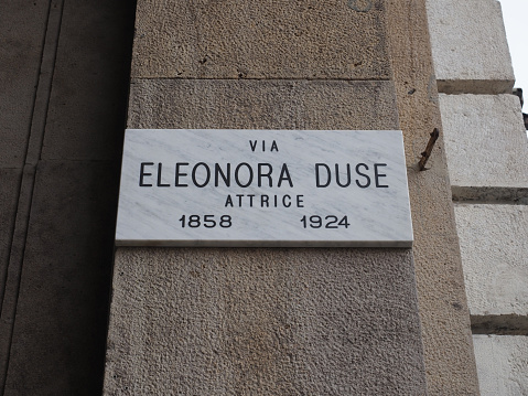 Turin, Italy - October 06, 2023: Via Eleonora Duse attrice translation actress street sign