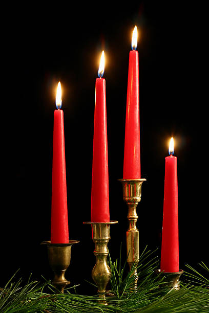 Four Red Candles stock photo
