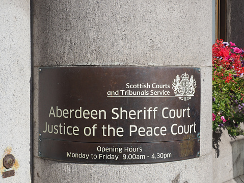 Aberdeen, UK - September 14, 2023: Aberdeen Sheriff Court Justice of the Peace Court sign