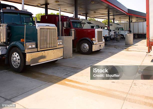 Several Trucks At A Rest Stop Gas Station Filling Up Tanks Stock Photo - Download Image Now