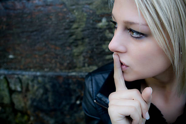 istock Girl with finger on lips - be quiet. 173762923