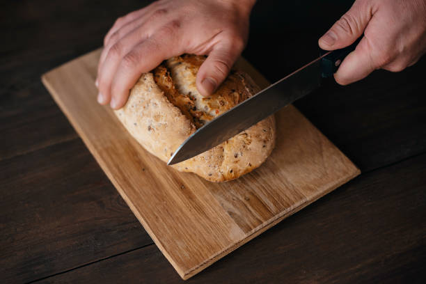istock Fresh bread on the kitchen table The healthy eating and traditional bakery concept 1737629934