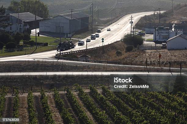 Rural Highway Through Vineyards Stock Photo - Download Image Now - Agriculture, Back Lit, Barn