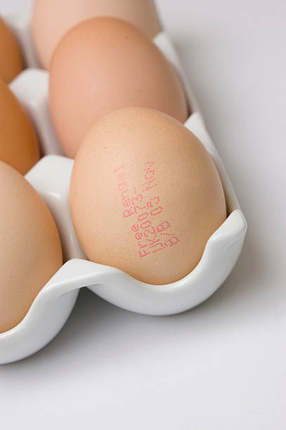 Fresh eggs with use by date stock photo