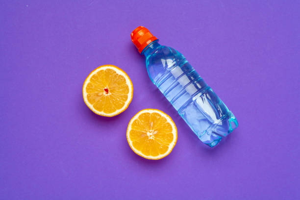 istock Citrus infused water bottle, flat lay, top view 1737635471