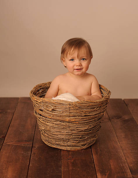 istock Little Boy Sitting in a Basket 173765887
