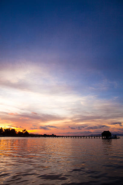 istock house over water at coastline 173765897