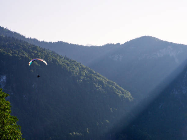 istock Bavarian Alps landscape with paraglider, Germany 1737675500