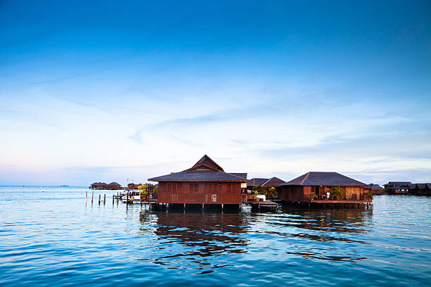 istock house over water at coastline 173767653