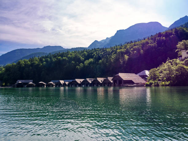 istock Konigssee lake boat house under sunlight, Germany 1737680391