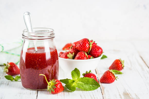 istock Strawberry jam in the glass jar. 1737695882