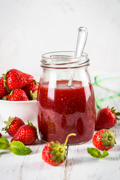 istock Strawberry jam in the glass jar. 1737696220
