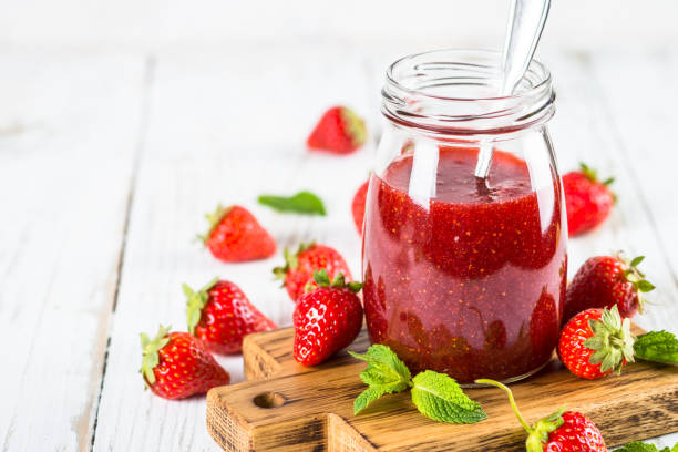 istock Strawberry jam in the glass jar. 1737696245