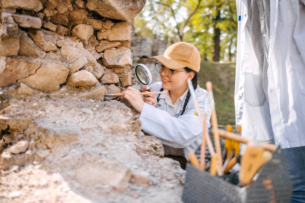 College students working at old historical archeology field