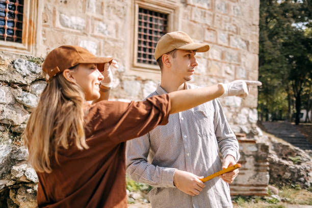istock Young archeologist working on the field together 1737697863