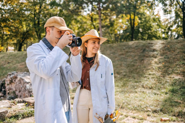 istock Young archeologist working on the field taking a photo shoot for archive 1737700026