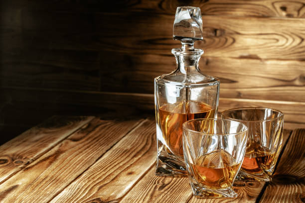 istock glasses with cognac, whiskey stand on the bar 1737712034