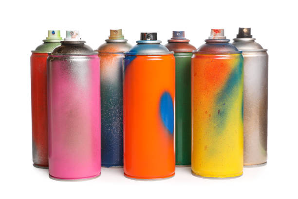 istock Used cans of spray paints on white background 1737713126