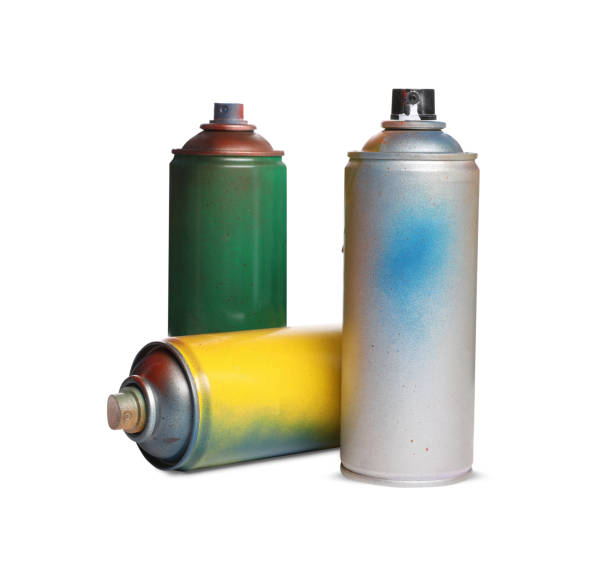 istock Used cans of spray paints on white background 1737713664