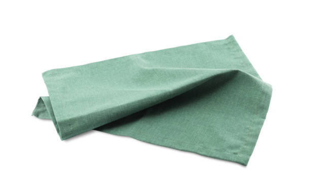 istock Green cloth kitchen napkin isolated on white 1737714246